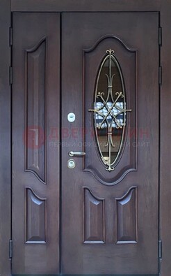 Темная металлическая дверь Винорит со стеклом и ковкой ДСК-239 в Ярославле