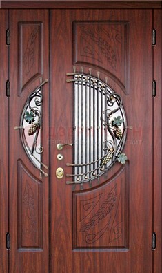 Железная дверь с виноритом и стеклом с ковкой ДВТ-170 в Ярославле